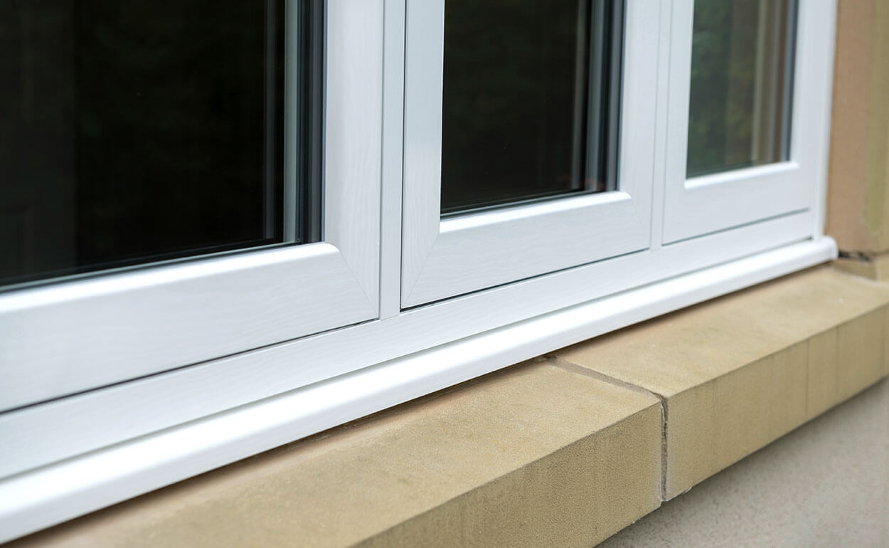 White uPVC flush sash windows close up